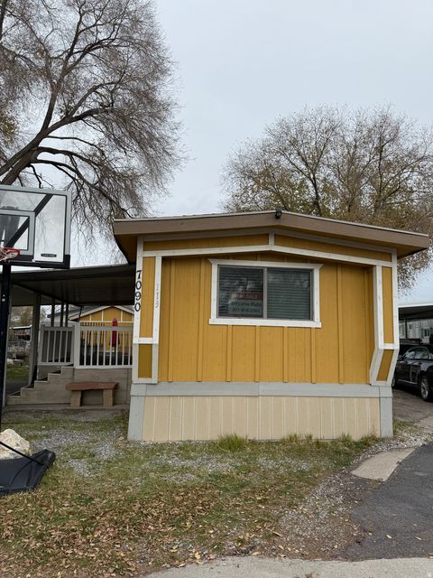 Photo of 7090 W PALOMINO DR. #113, West Valley City, UT 84128 (MLS # 2123824)