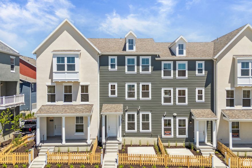 **Get a 2.99% rate your first year! Take advantage of our preferred lender 2-1 buydown program (4.99% fixed after)**. Live above it all in this modern 3-story Daybreak townhome! Enjoy open-concept living, private bedroom levels, and incredible natural light. Walk to parks, trails, and shops-plus full access to all Daybreak amenities!