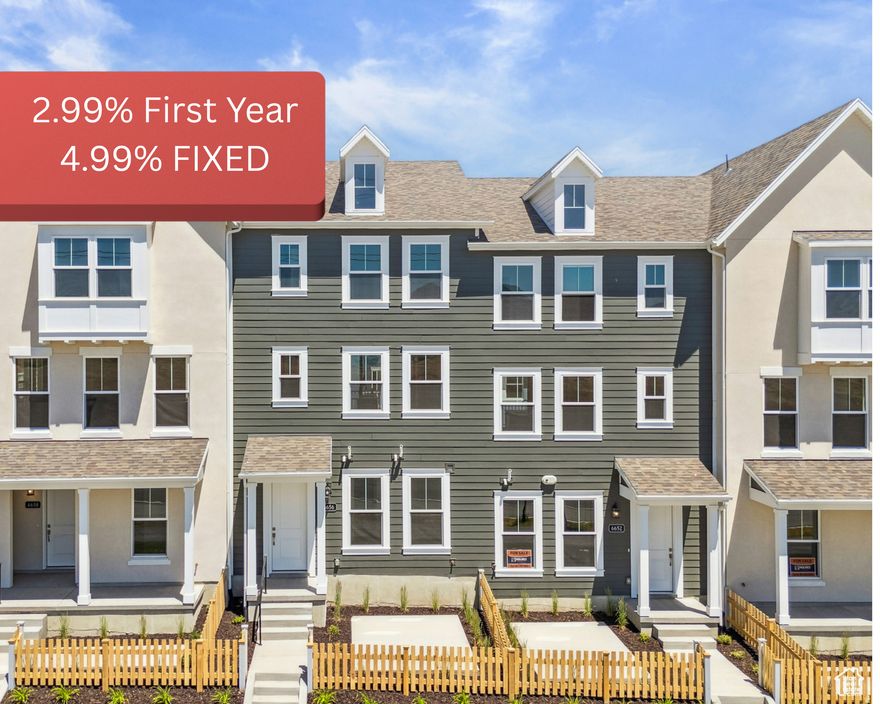 **Get a 2.99% rate your first year! Take advantage of our preferred lender 2-1 buydown program (4.99% fixed after)**. Live above it all in this modern 3-story Daybreak townhome! Enjoy open-concept living, private bedroom levels, and incredible natural light. Walk to parks, trails, and shops-plus full access to all Daybreak amenities!
