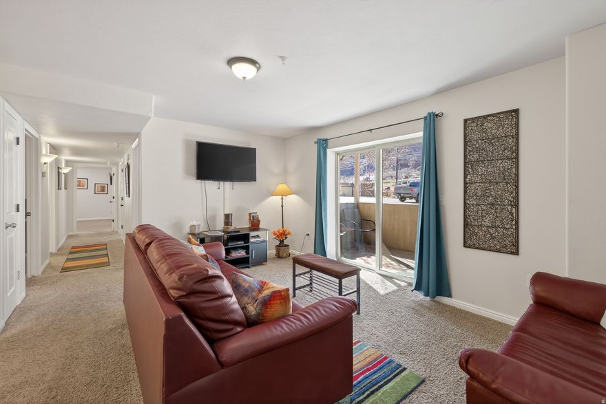 This ground-floor unit is a high-performing asset in the heart of Moab's desert playground. It is located near destinations that people travel from all over the world to enjoy like Arches National Park, Canyonlands National Park and the world-famous Slickrock Bike Trail. The spacious primary bedroom includes a private bathroom. Two additional bedrooms provide a place for family and friends to have their own space. There is a fully equipped kitchen, including a grill on the patio and a laundry room to address the effects of playing outside. Enjoy the ease of a comfortable place to rest after a day of adventuring in the desert southwest.