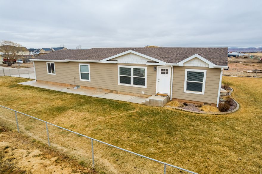 This well-maintained, move in ready home offers a bright, light-filled interior with fresh paint, durable LVP flooring, and tile for easy living. The functional layout provides comfortable living spaces and plenty of natural light throughout. Outside, enjoy a fully landscaped, fenced yard with a sprinkler system making it easy to enjoy and maintain. The 2-car garage and additional parking space give plenty of room for your vehicles, toys and camper. Square footage per county records. Buyer to verify all information including square footage.