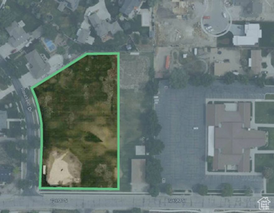 This 2.25-acre corner lot at 1263 E 13400 S, Draper, UT, is zoned RA2 and listed for $2,350,000. Located between a church meetinghouse and neighboring homes, it is zoned for low-density residential development with larger lot requirements, animal rights, and open spaces. Offers will be reviewed after the property owner's mandatory 30-day listing period expires. Zoning and allowed uses must be confirmed with the city.