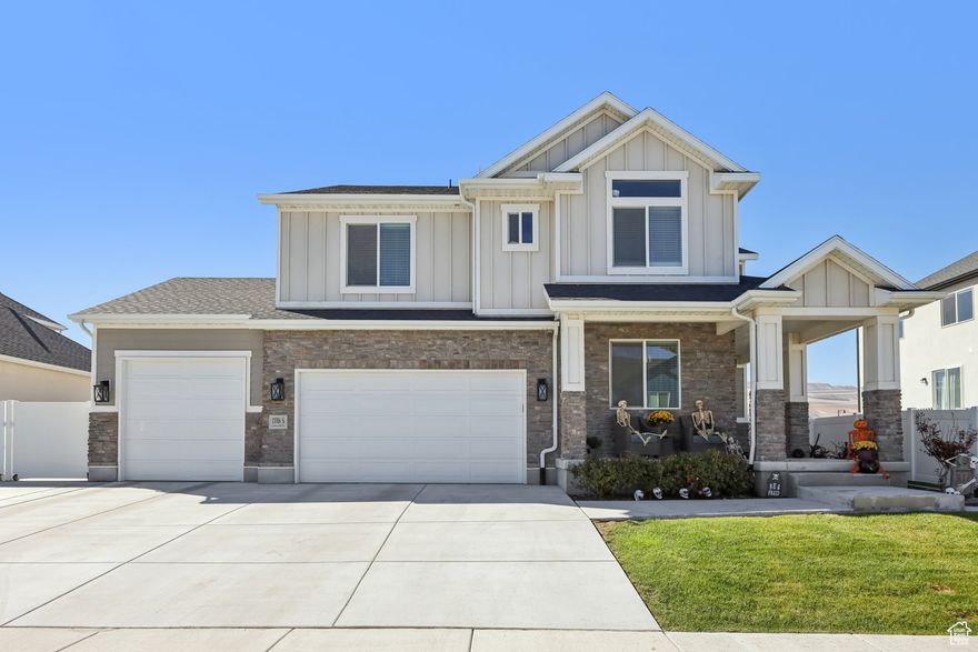 Beautiful two-story home with a finished basement and spacious three-car garage! Step inside to a tall, grand entryway that opens to an inviting great room with a gas fireplace and plenty of natural light. The kitchen features thick granite countertops, stainless appliances, tile backsplash, and a large dining area perfect for gatherings. A convenient mudroom and main-floor office add great functionality. Upstairs you'll find four bedrooms and three bathrooms-all on one level! The primary suite offers a garden tub, separate euro-glass shower, double vanity, and a large walk-in closet.  The finished basement provides a generous entertainment area and tons of cold storage. Outside, enjoy the incredible backyard with an in-ground trampoline, hot tub, playground, shed, and gazebo-covered patio. Extras include Jellyfish exterior lighting, garage overhead storage, and a quiet location near schools and shopping in a newer neighborhood.