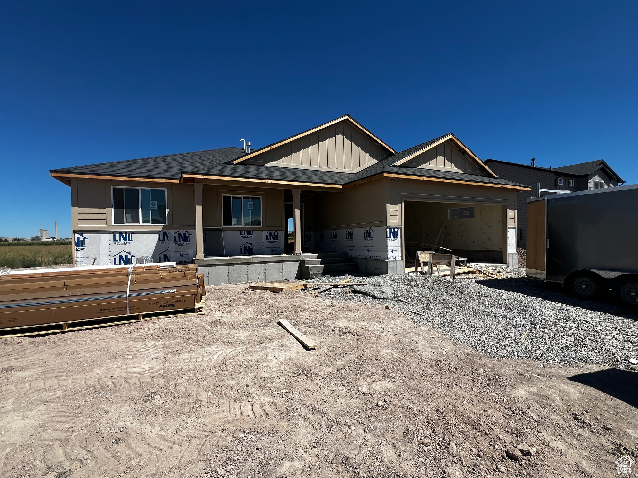 Brand New Rambler in Eastside View! Welcome to this beautifully crafted 3-bedroom, 2-bath home in the desirable Eastside View subdivision of Garland, Utah. Featuring a spacious open-concept floor plan, vaulted ceilings, and abundant natural light, this home is perfect for modern living. The kitchen boasts stylish finishes, ample counter space, and a functional layout that flows seamlessly into the dining and living areas. Enjoy the comfort of a private primary suite with a walk-in closet and ensuite bath. Exterior highlights include an attractive rock and vinyl finish, a 2-car garage, and a prime lot with scenic views. Act now and you may still have time to choose select colors and finishes to make this home uniquely yours! No HOA means more freedom to enjoy your property your way. Conveniently located near schools, parks, and all that Box Elder County has to offer!
