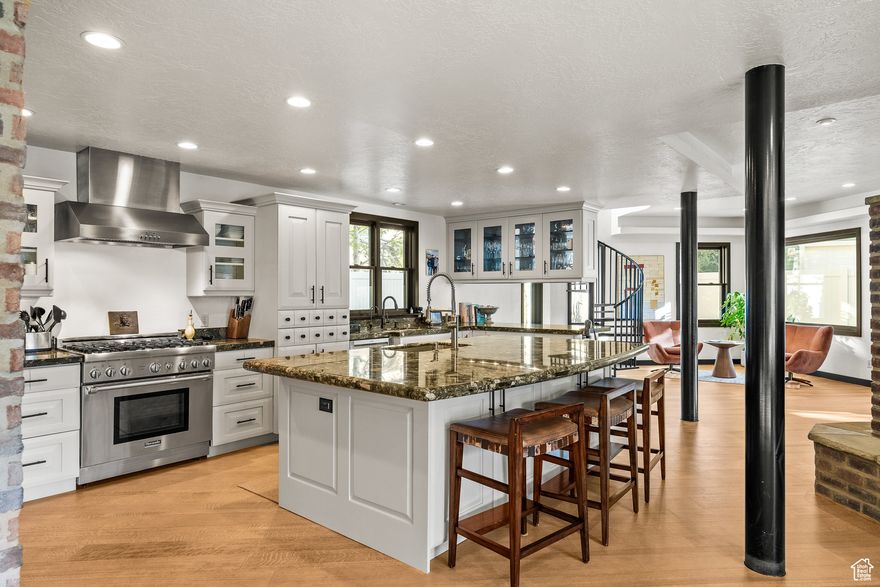 Perfectly positioned in the heart of Prospector Park, this charming home places you steps from Park City's classic, Rail Trail system, an easy bike ride to Old Town, and within walking distance to restaurants, and everyday conveniences. Known for its local character and unbeatable access to Old Town, Prospector offers a vibrant neighborhood setting just minutes from Park City's elementary and high schools.  Designed for year-round mountain living, the open-concept floor plan features hardwood floors, exposed brick, stone accents, and abundant natural light. The kitchen and spacious family room create the perfect backdrop for relaxing or entertaining, while three bedrooms-including a generous primary suite with an oversized closet-offer both comfort and privacy. The fenced backyard is an outdoor haven with a patio, firepit, and dining area, ideal for gatherings in every season. This turnkey home has been thoughtfully upgraded throughout with new hardwood floors, updated bathrooms, modern kitchen appliances, enhanced lighting, ceiling fans, window shades, a reverse osmosis filtration system, water softener, heaters, exterior paint, and new gutters.  Whether hosting aprs-ski evenings or summer barbecues, this home is the perfect basecamp for mountain living and lasting memories all year long.