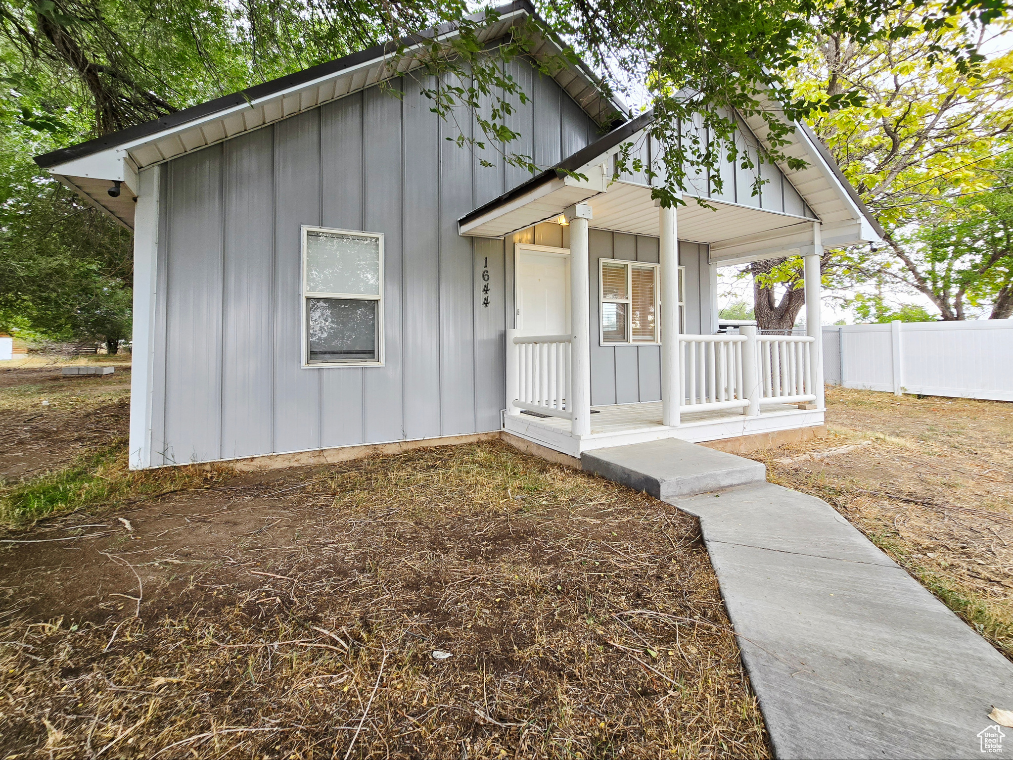 This cozy, single-level cottage is full of charm and character, offering 2 comfortable bedrooms, 1 bathroom, and a bright open-concept layout that makes the home feel spacious and inviting. It's truly move-in ready and blends modern updates with a classic cottage feel. Sitting on a generous .75-acre country lot, there's plenty of room to enjoy outdoor living while still being just minutes away from everything Vernal has to offer. Whether you're looking for a full-time residence, a weekend getaway, or a fantastic vacation rental opportunity, this property is a rare find with endless potential.