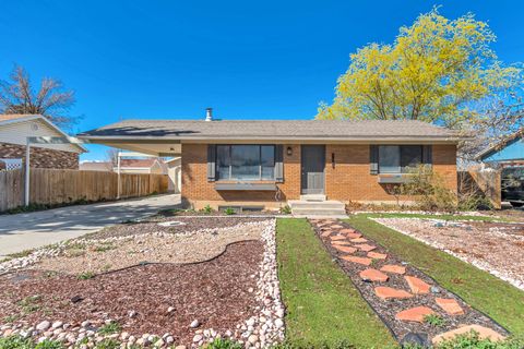 Photo of 7628 S CASA VERDE ST E, Midvale, UT 84047 (MLS # 2144620)