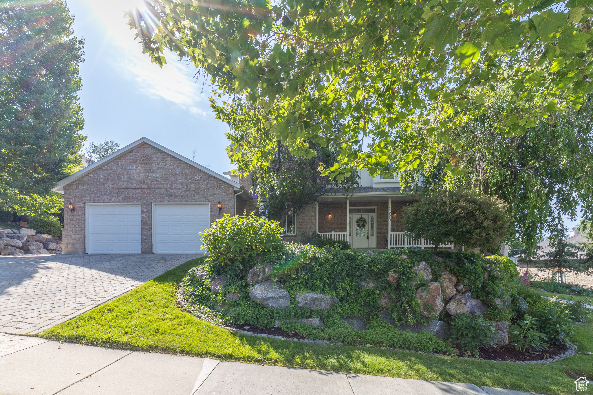 Experience refined living in this beautifully updated home, ideally situated in Lindon's prestigious Canberra neighborhood. Breathtaking views of Utah Lake and the valley greet you through stunning, light-filled windows, creating a sense of openness and serenity. Throughout the home, updated lighting, custom built-ins, vaulted ceilings and beautiful trim work add timeless character and charm. The formal living and dining area combine to create an elegant, light-filled great room - offering ample space for both grand entertaining and intimate gatherings. The thoughtfully designed kitchen, dining, and sitting room blend style and function, featuring quartz countertops, double ovens, a countertop range, single-basin sink, ample cabinetry, a new refrigerator, and a cozy fireplace - the perfect setting for everyday living and seamless entertaining. Upstairs, discover generously sized bedrooms, including a spacious and relaxing primary suite filled with abundant natural light and remodeled bath, offering a tranquil retreat at the end of the day. The lower level provides exceptional flexibility with a private mother-in-law apartment, offering the option of one or two bedrooms, one bath, a full kitchen, no-stairs walkway/entrance, a beautiful fireplace, and impressive daylight views. A spacious flex room, pre-wired with surround sound and projector hookups, is ideal for a home theater, game room, or executive office, complemented by a full wet bar. Step outside to enjoy a beautifully landscaped sanctuary featuring mature trees, fruit trees, perennials, garden boxes, a fire pit area, shed, patio, and a refinished deck - an inviting space for both relaxation and gatherings. Recent upgrades further enhance the home's value and appeal, including a new roof and gutters, new AC heat pump, remodeled baths, fresh paint, new stucco, and more. Square footage figures are provided as a courtesy estimate only and were obtained from appraisal. Buyer is advised to obtain an independent measurement.