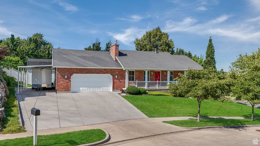 Nestled on the desirable east bench of Bountiful, this charming red brick home is full of character and charm. Enjoy breathtaking views from the comfort of your own deck. The home features five spacious bedrooms and three bathrooms, including a private primary suite with an ensuite bath and walk in closet. The fully finished basement offers additional living space with two bedrooms, bath, family room and separate outside entrance, ideal for guests or multi-generational living. Vaulted ceilings in the front living room, complemented by a wood burning stove, create a warm and inviting atmosphere. The fully fenced and landscaped backyard includes TREX decking, mature landscaping, and large shed for extra storage. A spacious driveway, covered carport and oversized garage provide ample parking options. Don't miss out on this fantastic property!