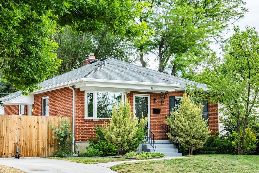 Welcome to this charming 3 bedroom, 2 bathroom bungalow nestled in the heart of Sugar House. Full of warmth, character, and thoughtful updates, this home blends cozy interior living with incredible outdoor spaces designed for gathering, relaxing, and entertaining. Step inside to beautifully refinished hardwood floors, abundant natural light, and renovated bathrooms that bring a fresh, timeless feel to the home. Major system updates provide peace of mind including a new furnace, A/C, water heater, and whole-house steam humidifier all completed in 2021. New windows throughout the main floor add comfort and efficiency while preserving the home's classic bungalow charm. Out back is where this home truly shines. Enjoy summer nights on the spacious Trex deck and patio, host friends around the firepit, or unwind in the private backyard surrounded by updated fencing and mature landscaping. Whether it's slow mornings with coffee or evenings filled with conversation and string lights, this yard was made for outdoor living. Additional upgrades include a garage door update in 2024, making this home as functional as it is inviting. Located just minutes from Sugar House parks, restaurants, shopping, and local favorites, this is the perfect blend of comfort, charm, and lifestyle.