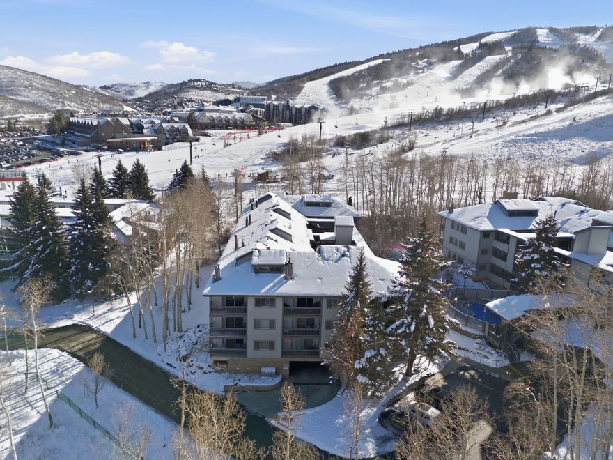 Unit 123 at Snow Flower offers something that's getting harder to find in Park City: space, flexibility, and direct ski access, all in one place. With easy access to the ski path and the lifts at Park City Mountain Resort, this is the kind of condo that works whether you're here for a weekend, a season, or something in between.  The layout includes three bedrooms and three-and-a-half bathrooms, with two suites on the main level and additional space upstairs that allows the home to comfortably sleep up to eight. The extra loft area adds flexibility, whether it's used for guests, kids, or simply extra breathing room.  Positioned on the quieter side of the building, the condo looks out toward a grove of trees and across toward Park City, rather than directly onto the ski slope side. The result is a more private feel, while still being just steps from the ski path and lifts.  Snow Flower is one of Park City's most established nightly rental communities, and larger floor plans like this consistently attract strong demand. The combination of true ski access, multiple sleeping areas, and a proven location makes this condo easy to use personally and straightforward to rent when you're not here.  For buyers thinking longer-term, there may also be opportunities to acquire additional units within the community, allowing for a larger ski-in/ski-out footprint over time, something that's becoming increasingly difficult to do in Park City.