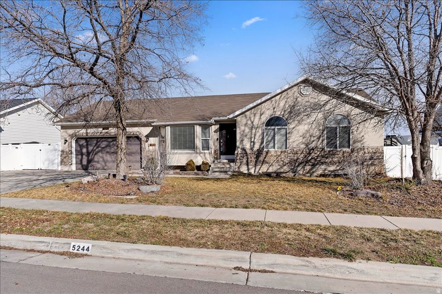 Welcome to 5244 W. Shaggy Peak Drive in Riverton, Utah - This spacious home features 2,588 total square feet of well-designed living space, including 5 bedrooms and 3 bathrooms, plus a 2-car garage and dedicated RV parking. The main floor offers 1,317 sq. ft. of comfortable single-level living with 3 bedrooms, 2 bathrooms, a bright kitchen, laundry room, and a welcoming family room area-perfect for everyday living and entertaining. The fully finished basement adds 1,271 sq. ft., complete with 2 additional bedrooms, 1 bathroom, a large family room area, and flexible space for hobbies, a home office, or storage-providing room for everyone to spread out and enjoy. Situated on a generous .21-acre lot, the property is surrounded by mature trees and fruit trees, creating a peaceful, established setting. The fully fenced backyard is designed for both relaxation and entertaining, featuring a patio, gazebo, storage shed, and dedicated garden area-ideal for summer gatherings, gardening enthusiasts, or simply enjoying Utah's beautiful seasons. With its thoughtful layout, abundant space, and desirable location close to parks, schools, shopping, and commuter routes, this home combines comfort, convenience, and outdoor charm. Don't miss the opportunity to make this exceptional Riverton property your next home!