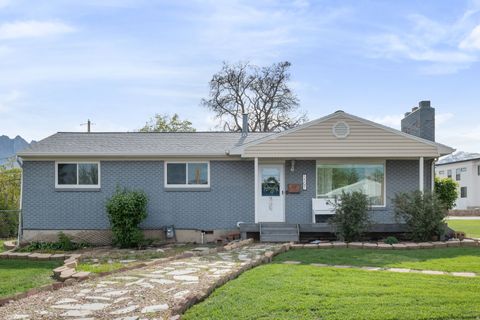 Photo of 5597 S HILLSIDE DR E, Murray, UT 84107 (MLS # 2153585)