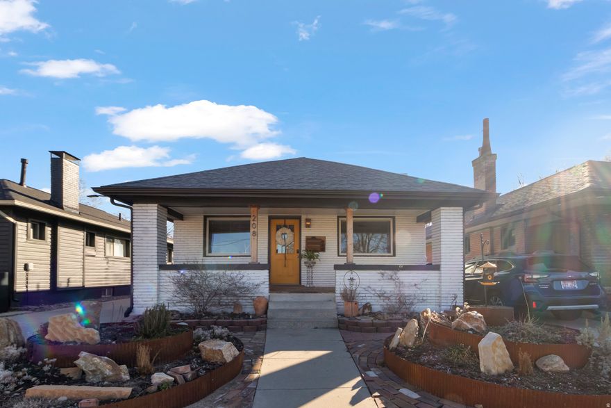 Charming renovated Bungalow close to Downtown. Across from the SLCC Campus. Xeriscaped front yard and landscaped backyard with grass and trees. Secluded and perfect for those summer BBQ's. Newer Roof, furnace, and central air. Remodeled kitchen with manufactured quartz countertops. Remodeled bath with rain showerhead. Laminated waterproof flooring throughout the home. This home has all the old charm and the new charm.   Square footage figures are provided as a courtesy estimate only and were obtained from County records.  Buyer is advised to obtain an independent measurement.