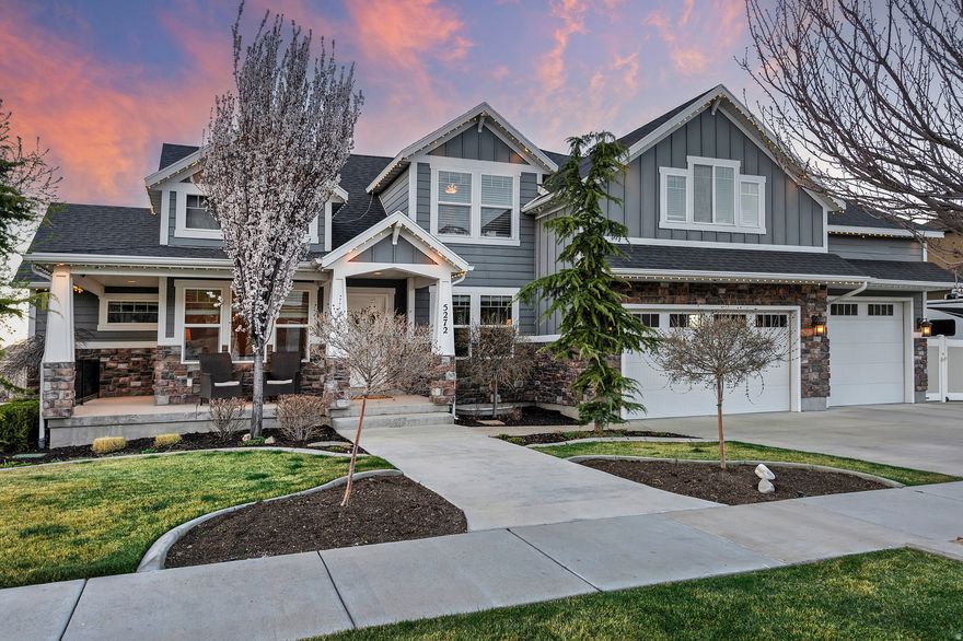 Nestled in the coveted Herriman foothills, this impeccably cared-for home sits on a generous lot with a three-car garage and a fully fenced yard that showcases breathtaking mountain and valley views. A welcoming wraparound porch opens to a private backyard, perfect for outdoor living and entertaining. Spanning nearly 5,000 square feet, this home offers five bedrooms and four bathrooms in an open, bright, and airy layout that captures natural light at every turn. The recently finished basement adds valuable living space, featuring a theater room, sauna, and an exercise room. Conveniently located near top-rated schools, shopping, entertainment, and a variety of dining options, this home combines luxury, comfort, and easy everyday living.