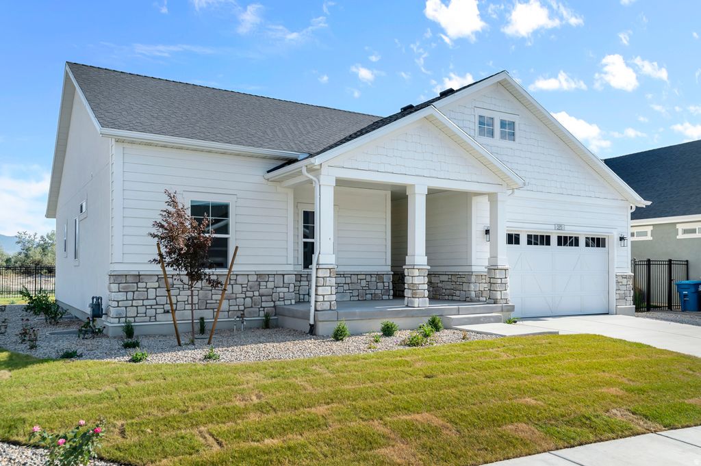 Photo of 595 W JUNEGRASS LN, Stansbury Park, UT 84074 (MLS # 2125293)