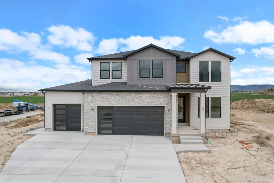 This new construction home in Salem is designed to feel like a custom home, without the custom price tag. The layout provides functional living with open gathering spaces and modern finishes throughout, offering 4 bedrooms and 2.5 bathrooms. Conveniently located just 10 minutes from the freeway, the home is close to shopping and essential services while still offering a quiet neighborhood setting. You'll appreciate being right next to Salem Junior High and Salem High School, with easy access to parks and community amenities. This is a rare opportunity to move into a brand-new home in a new community in Salem. *Builder willing to finish the basement*