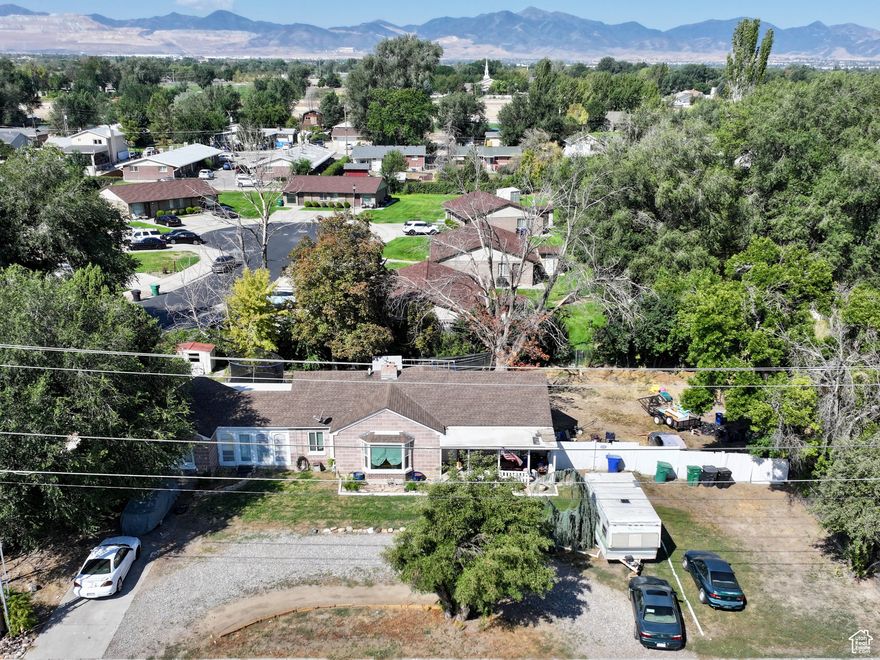 PRICE IMPROVEMENT BY $133,333.  BRING YOUR BEST OFFER AND MAKE THIS YOUR NEW COMMUNITY. 3 parcels to equal 1.2 acres facing east on Redwood Rd. The City has allowed .18 acre lots to the north and agreed that this would be allowed on these parcels as well. Being sold with 8518 S and 8510 S Redwood Rd. Parcel # 21-34-377-041 and 21-34-377-034. The road to the north is on title to be a right of way to these properties. THERE ARE TENANTS IN BOTH HOMES, PLEASE DO NOT DISTURB TENANTS OR THEIR PERSONAL PROPERTY. Please make an appointment with agent to view the properties. Square footage figures are provided as a courtesy estimate only and were obtained from the county. Buyer is advised to obtain an independent measurement.