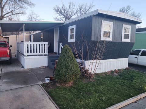 Photo of 3187 S EASTCREST RD W #11A, West Valley City, UT 84120 (MLS # 2129270)