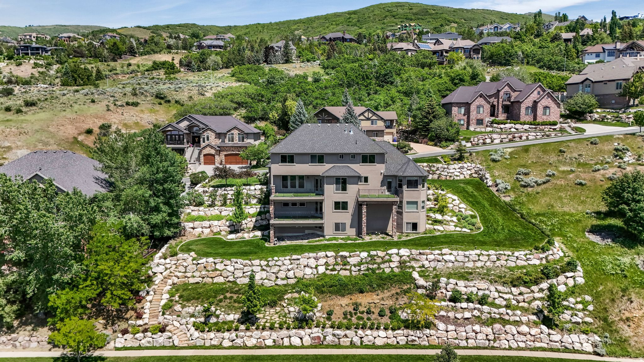 Multi-level residence featuring extensive retaining walls