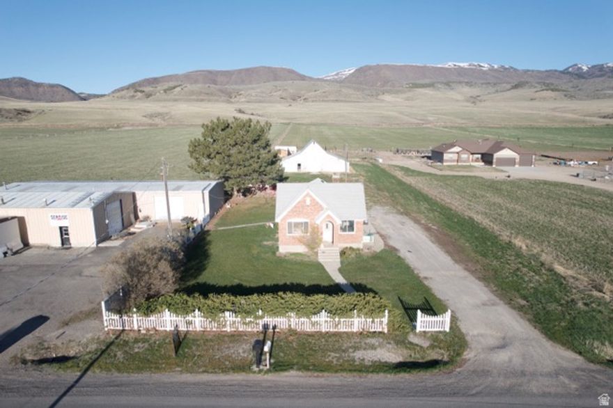 Zoned Highway Commercial in Dayton, Idaho.  Former home of Sunrise Manufacturing, this blank canvas is ready for your next great idea!  Historic barn on property that has been a landmark for many years.  2 sheds, 30x60 and 30x90 highlight the commercial possibilities.  Come take a look and bring your ideas for future business.  Buyer to verify all information.