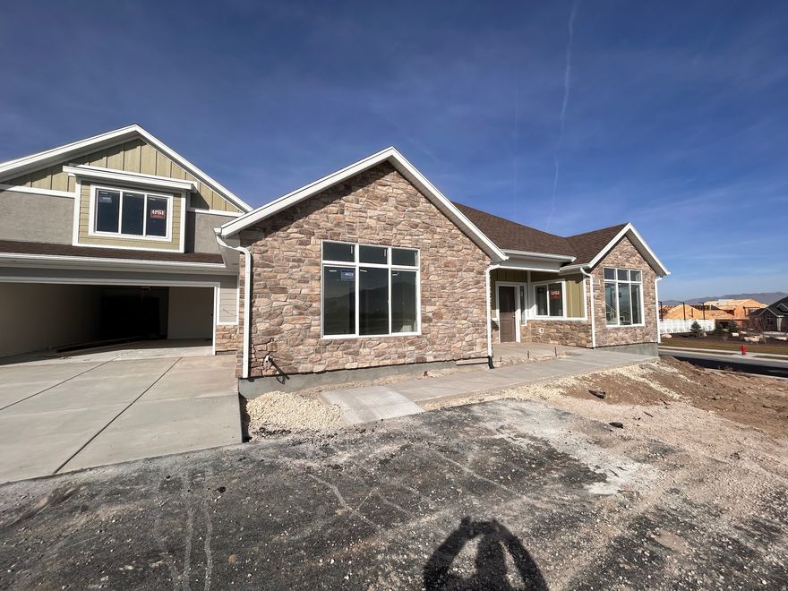 This is an amazing home located in a new 55+ community. It features a beautiful sunroom and stunning mountain views. It has a wonderful great room with tons of upgrades including upgraded cabinets, countertops, and floor coverings. Come and see it today!
