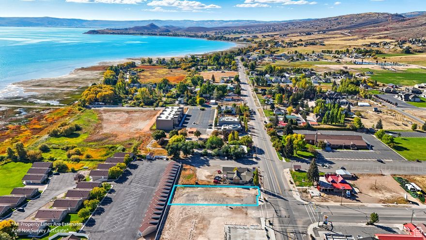 Rare opportunity to own the most valuable commercial land in the Bear Lake area! Located at the main intersection of Bear Lake Blvd-right at Garden City's only stoplight! Premier Location  Maximum visibility & accessibility__Versatile Use  Retail, office, hospitality, or mixed-use (w/ conditional use) High-Value Investment  Strong appreciation potential Includes One Water Share  Swan Creek Canal Company_($7k Value) - Year-round tourism, city utilities stubbed to lot, and unbeatable exposure make this a strategic 1031 exchange opportunity for investors seeking ROI with long-term growth. Call today for full details! The link below is to the layout and design that I have engineered, and that plan is included with the purchase of this property_($12k value) COPY & PASTE: https://www.youtube.com/watch?v=BQuG81DIHUI
