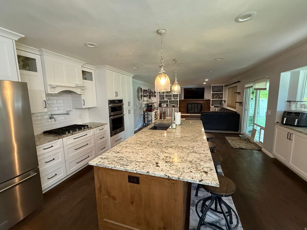 Photo of 780 W WALDEN HILLS DR, Murray, UT 84123 (MLS # 2164449)