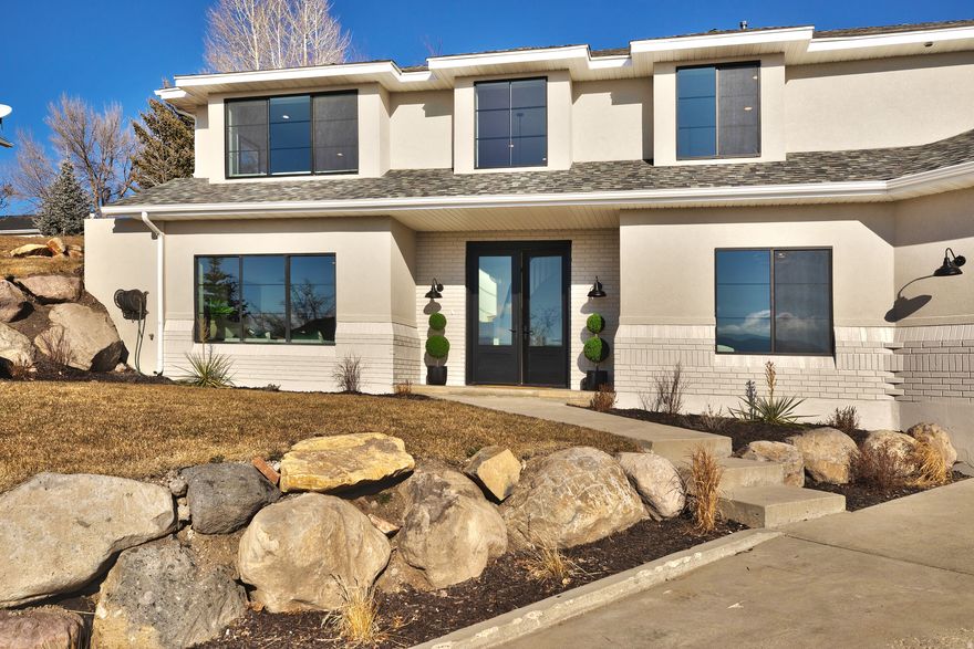 This beautifully reimagined Valley Hills home offers a sophisticated blend of modern design and timeless appeal. Fully remodeled with meticulous attention to detail, the residence showcases expansive valley views from the front windows and an elegant, well-proportioned layout featuring five bedrooms, including two primary suites and a versatile upstairs loft. Throughout the home, luxury finishes elevate every space, creating a refined yet welcoming environment ideal for both elevated entertaining and effortless everyday living.