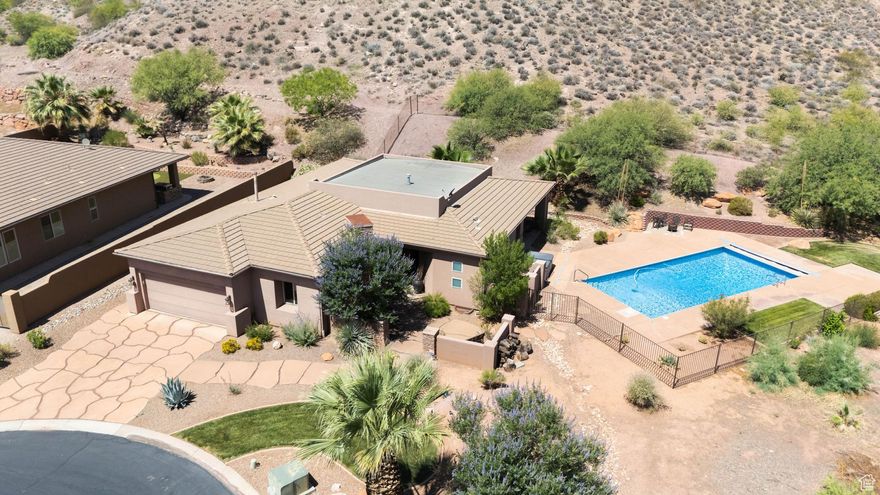 584 S Dixie Dr #26 - Views, Vibes, and Zero Compromises~ This 3-bed, 3-bath stunner nails the trifecta: every bedroom gets its own ensuite, the backyard brings full resort energy with a private pool and spa, and the views? Unreal-panoramic shots of red rock, Pine Valley Mountain, and the city skyline. Tucked at the end of a quiet cul-de-sac in a gated community, you get top-tier privacy with all the perks of St. George luxury living.