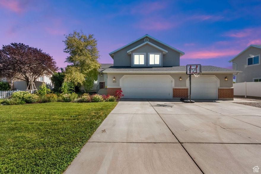 Prime Riverton location!  Beautiful home with an open floor plan and abundant natural light throughout.  A True garden enthusiast's delight featuring 1000 sq foot in- ground garden plus 4 raised beds, 3-bin compost system, 2 apple trees, 1 peach tree, 1 almond tree, grapes, a large raspberry patch and several blackberry plants offering lovely outdoor spaces perfect for planting relaxing and entertaining. Enjoy large RV parking and peace of mind with roof,  furnace and A/C all replaced in 2021. Water heater is 6 years old.  Room to make a 5th bedroom down.  Conveniently located near shopping, dining and commuter routes for easy living.