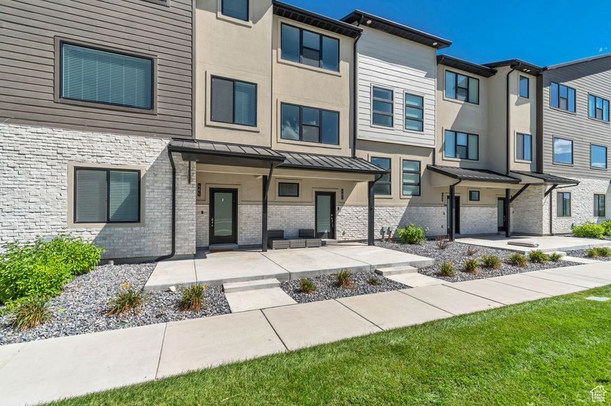 Beautiful ready to move into townhome located near TRAX station, with easy access to shopping and I-15.  Priced more competitively than the competition, especially when considering the well cared-for and CLEAN condition of this unit.  Extra build outs in closets and garage space for storage.  Windows sized and placed on every level that bring in lots of natural light, making the home feel spacious and bright.  Living areas and kitchen are open and spacious.  Primary suite has walk in closet, double vanities, and is well appointed.   Easy to show!