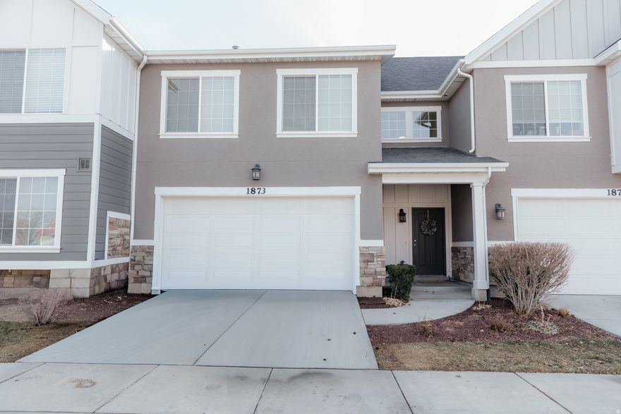 Welcome to this beautifully designed 3-bedroom, 2.5-bathroom UPDATED townhome offering 1,456 sq ft of living space in a prime Riverton location! Situated in a quiet location and neighborhood, this home is within walking distance to Riverton City Park, restaurants, shopping, and Vasa Fitness. The open-concept first floor seamlessly connects the spacious kitchen and living room, making it perfect for entertaining. Enjoy a cozy fireplace, vaulted ceilings, and large windows that flood the home with natural light. BEAUTIFUL updates throughout include LVP flooring, shiplap, accent walls, freshly painted kitchen cabients and more! Granite counter tops and Stainless steel appliances, Fridge included!  Upstairs, the large master bedroom boasts stunning vaulted ceilings, creating an airy and relaxing retreat. Don't miss this opportunity-schedule a showing today!