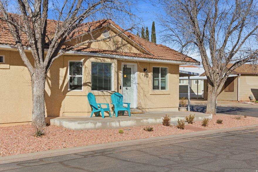 Set on a fully landscaped corner lot in the 55+ King Row Estates community, this 2 bedroom, 2 bathroom home offers 2 living spaces, 2 outdoor living spaces with a thoughtful layout and bonus basement. Features include 32" wide doorways, a ramped walkway from the covered parking to the front door and a roll-in shower. The main living area includes an open floor concept, bay box windows, blinds, a gas fireplace, large laundry room with built-in cabinets and countertop, plenty of storage, and the spacious kitchen is equipped with Corian countertops, attached large overhang, and a reverse osmosis water system. The finished basement provides a second living room that works well for guests, hobbies, or everyday use. Additional features include a storage shed, covered parking for two vehicles, extra storage in the basement, and an alarm system. Yard maintenance is included, making daily upkeep easy. King Row Estates offers community amenities including a clubhouse, swimming pool, hot tub, and workshop in a convenient Washington location. The home is within close proximity to plenty of shopping (including Costco and downtown Washington City). Nearby, the Grapevine Mountain Biking/Hiking trail system with easy access to hundreds of thousands of acres of public lands to fill any outdoor/ATV/UTV enthusiast's adventurous appetite. Not only is this property minutes away from a wide array of amenities, but it is also a short drive to some of America's most breathtaking destinations, including Zion National Park, Bryce Canyon National Park, and the north rim of the Grand Canyon. It is also near state parks and national forests, such as Snow Canyon, Sand Hollow Reservoir, Gunlock Reservoir, Quail Creek Reservoir, Toquerville Reservoir (coming soon) and Dixie Forest, enhancing the allure of the location. Situated at an elevation of 2,700 feet above sea level, at the crossroads of the Mojave Desert, Colorado Plateau, and the Great Basin, Southern Utah stands out as one of America's most captivating and geologically distinctive regions. This remarkable home epitomizes the essence of arriving in this extraordinary setting. All information provided is reliable but not guaranteed. The buyer is responsible for verifying all listing details, including square footage and acreage, to their own satisfaction.