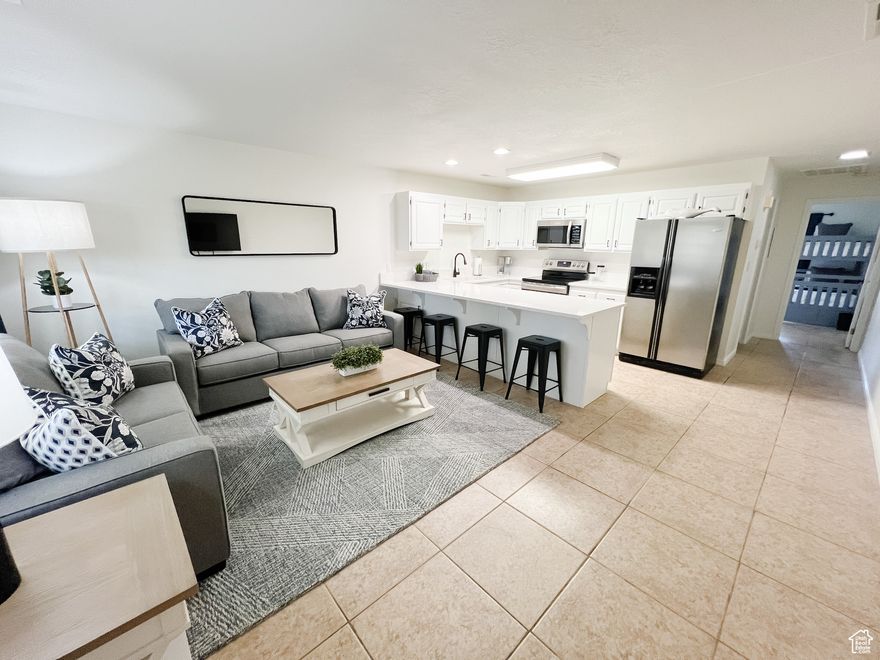 Fully Renovated Condo in Las Palmas Resort - Turnkey & Ready for you! This beautifully renovated condo offers the perfect blend of modern comfort and resort-style living. Step inside to discover a completely updated interior featuring fresh paint, new flooring, stylish light fixtures, and a contemporary kitchen with quartz countertops and stainless steel appliances. The open-concept layout is bright and inviting. Whether you're looking for a vacation home, investment property (nightly rental approved!) this unit checks all the boxes. As part of Las Palmas Resort, you'll have access to multiple pools, hot tubs, a fitness center, sports courts, pickle ball and walking trails -all just minutes from golf courses, hiking, and downtown St George.  Investor special! Also check out #1627, the owner selling both, and is willing to give a 'multi-unit' discount! New HVAC unit 2025.