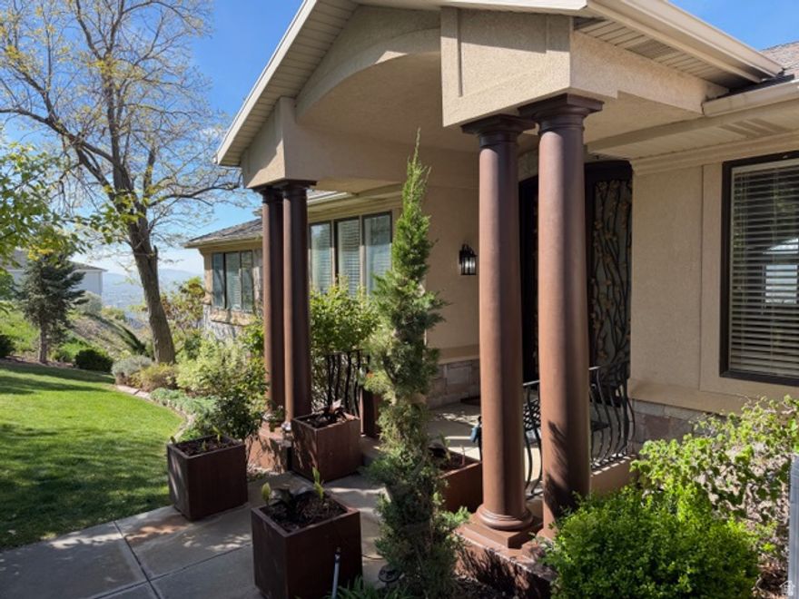 Stunning, fully remodeled luxury home perched above the city with breathtaking panoramic views of the Salt Lake Valley. Nestled in one of Salt Lake City's most sought-after neighborhoods, this home seamlessly blends sophisticated design with top-tier upgrades.  Inside, you'll find a chef's kitchen featuring premium Wolf and Sub-Zero appliances, along with all-new paint, flooring, and designer lighting throughout. Comfort is unmatched with three brand-new furnaces and A/C units, providing efficient, year-round climate control.  Designed for both relaxation and entertaining, the home offers four private decks and a spacious family room with an indoor pool-perfect for enjoying the incredible views in every season. The beautifully landscaped yard includes a custom putting green, creating a true resort-style experience at home.  This home is also equipped with modern smart features, including a Sonos sound system, Lockly smart locks, Nest thermostat, and a MyQ garage door opener with battery backup and integrated cameras-offering both convenience and peace of mind.  Additional upgrades include a whole-home tankless water heater and reverse osmosis water system. From its elevated setting to its impeccable finishes, this home delivers the perfect blend of luxury, lifestyle, and location. Truly move-in ready and designed to impress.