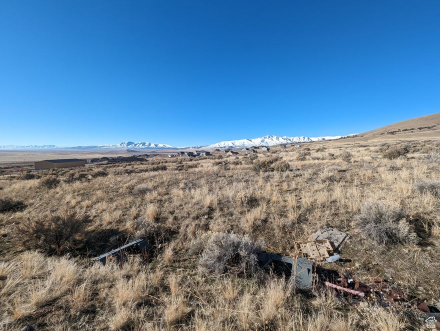 Views, views, and more views. Own your own slice of heaven as you look out on the quiet Stockton valley. This land is separated into three different parcels (06-019-0-0006 for 249.86 acres, 06-019-0-0010 for 320 acres, and 06-018-0-0006 for 120 acres) and overlooks the valley.  There is plenty of space to put everything that you need or dreamed of on this great property just outside of Tooele. Have the feeling of small town but the convenience of Tooele within a 20 minute drive or Utah County is just a 45 minute drive as well!  There is a working well on the property with water rights as well. Access to the property is being run through the BLM land that is adjacent to the northern most parcel.  Come and see what quiet really sounds like!  All 3 parcels are being sold together at this time.   Square footage figures are provided as a courtesy estimate only .  Buyer is advised to obtain an independent measurement.