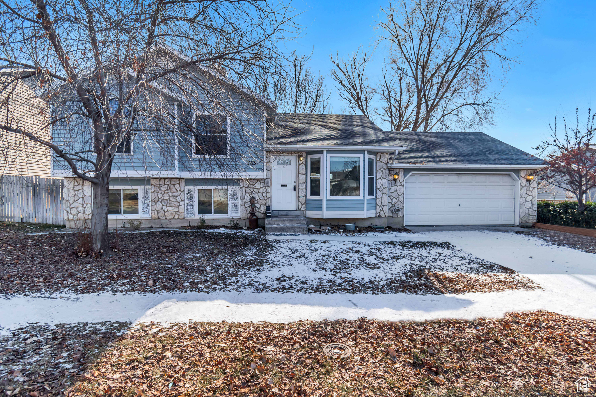 This 4-bedroom, 2-bathroom home in Sandy's South Meadows neighborhood offers a chance to build equity while adding your personal touch. Features include vaulted ceilings, a gas range with dual ovens, a primary suite with an ensuite bathroom and walk-in closet, a new water heater, and a roof under two years old. The fully fenced yard, maintenance-free stone and siding exterior, and a quality-built shed add practicality. Conveniently located near River Oaks Golf Course, grocery stores, Real Salt Lake stadium, and restaurants, this home is ready for your updates. **   All figures are provided as a courtesy estimate only. Buyer is advised to verify all.