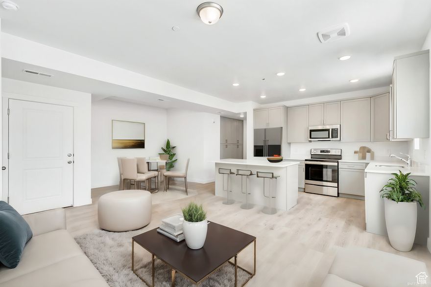 **QUALIFIES FOR $20K SB240 Down payment Assistance!** Stylish condo in the heart of Daybreak-steps to dining, shops, parks & TRAX. Bright open layout, sleek finishes, and modern vibe. Visit sales office: 5263 W Reventon
