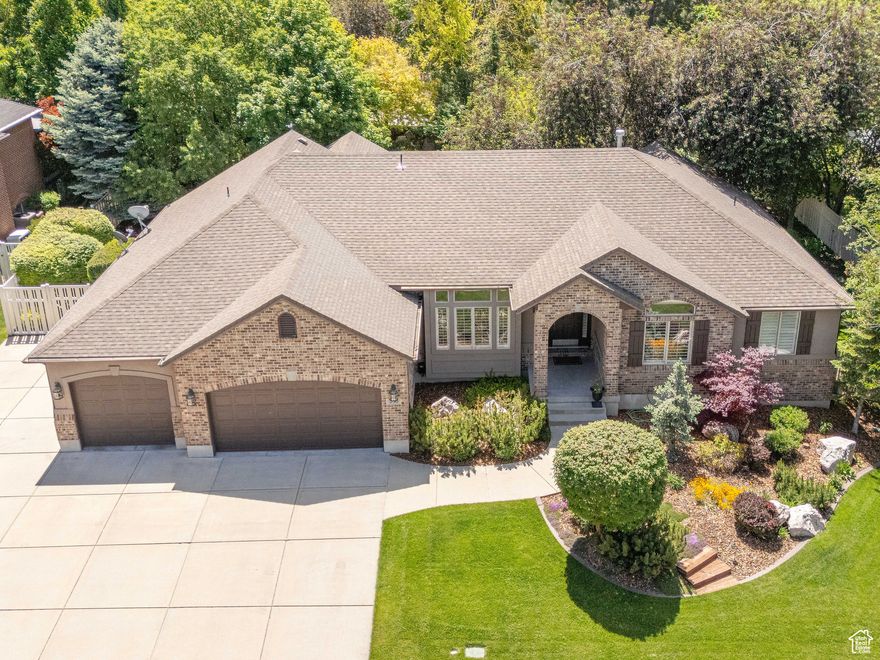 In addition to a price adjustment, the Seller is offering a $30,000 Buyers incentive! Come see this charming rambler nestled in the cul de sac of an exceptional Kaysville neighborhood! The home has an open layout kitchen and family room but still offers both a formal living and dining room--a rare find!  Vaulted ceilings and hardwood and tile flooring add to the charm.  An office, guest bedroom, and remodeled bath are all on the main floor along with the primary bedroom. The primary suite features a newly remodeled bathroom and walk-in closet. The lower level boasts two spacious bedrooms joined by a jack and jill bathroom plus an additional bedroom currently finished as a gym.   Add in a full kitchen and theater/game room and you have the perfect space for gathering. Enjoy the dreamy, secluded backyard with a covered patio and spa, mature, professional landscape thoughtfully designed with a firepit area, 1/2 court basketball and children's playground, plus a beautiful waterfall feature that adds to the outdoor ambience.   The ideal yard for entertaining or as a quiet retreat.    A new furnace and HVAC system were installed in April 2025, new water softener in 2024, and a new water heater in 2020.  There is even a full house Generac generator for extra ease of mind!  Ask about the 1% one-year rate buydown our preferred lender is offering.  Don't miss the chance to own this beautiful property in an amazing area with no HOA!   Square footage provided as a courtesy estimate and obtained from County Tax Records.  Buyer advised to obtain independent measurements.