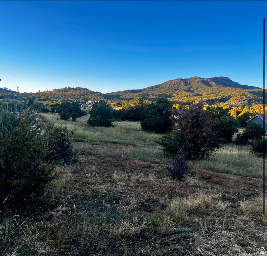 Welcome to Zion Ridge, an exclusive enclave within Zion Ponderosa Ranch Resort. This prestigious lot, the first on the market in years, offers pristine views of Checkerboard Mesa and surrounding mountains, just a half-mile walk from Zion National Park. The new East Side Visitor Center, under construction, will offer licensing for hiking permits and tram services into and out of the park, bringing Zion's splendor to your doorstep. Situated just 2.5 hours from the Grand Canyon, 1 hour from Bryce Canyon, and Capitol Reef National Parks, and 1.5 hours from Lake Powell, this location is a central hub for visitors worldwide. The seller, eager to sell, is also a contractor ready to build your dream home. Enjoy exclusive access to resort amenities and create a lasting legacy for your family.