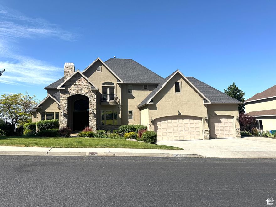 BELOW APPRAISAL - Assumable VA loan. Amazing valley views with main level living, gourmet kitchen includes 2 dishwashers, trash compactor, wolf cook-top, dual ovens and granite top counters. Large main level primary suite includes fireplace, dual sink bathroom vanity, jetted tub and custom walk-in closet. Dedicated office and formal dining room, living room and family room. Second level includes bedroom with fireplace, large walk-in closet with bathroom, bedroom with balcony, and guest en-suite bedroom. Basement is amazing with valley views, full kitchen, 1 bedroom,  2 bathrooms and ample storage areas. 3 oversized heated car garage, Mature beautiful landscaping and RV driveway. 2 water heaters, dual central AC and water softener. Brand NEW ROOF