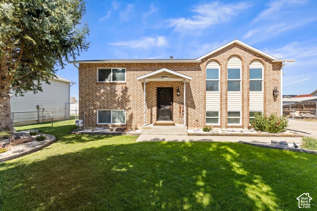 Photo of 5051 MIDLAND DR, Roy, UT 84067 (MLS # 2188389)