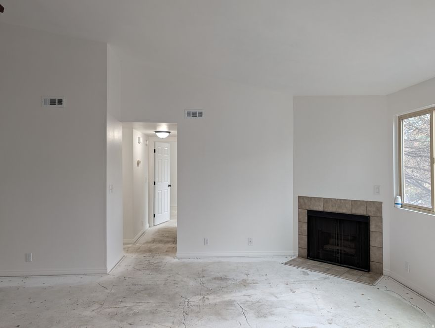 FRESHLY painted, cheerful, top level condo! Ready for you to install the new flooring of your choice. Well kept community in a central location close to shopping, freeway and easy ski resort/mountain access. Swimming pool, tennis court and club house on site. Perfect for an active lifestyle! Vaulted ceilings, plenty of storage, large windows, washer, dryer, refrigerator are included. Ready for your personality. Bring an offer! Property sold as-is, seller has never occupied. All figures per county records. Buyer to verify.