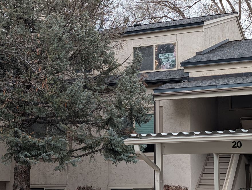 FRESHLY painted, cheerful, top level condo! Ready for you to install the new flooring of your choice. Well kept community in a central location close to shopping, freeway and easy ski resort/mountain access. Swimming pool, tennis court and club house on site. Perfect for an active lifestyle! Vaulted ceilings, plenty of storage, large windows, washer, dryer, refrigerator are included. Ready for your personality. Bring an offer! Property sold as-is, seller has never occupied. All figures per county records. Buyer to verify.