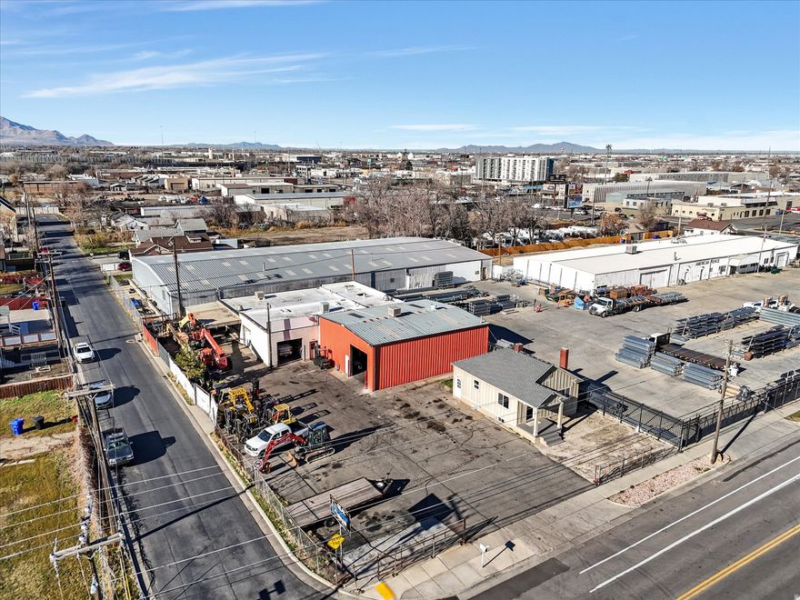 Prime Salt Lake industrial owner-user opportunity offered at $1,900,000. This versatile property features approximately 7,400 SF of industrial space with TOD-COR zoning, ideal for a variety of commercial or mixed-use operations. The site includes a fully remodeled on-site residence/duplex with 2 bedrooms, 2 bathrooms, 1 kitchen and connections for a second one, providing flexibility for live-work or additional income. Property highlights include three ground-level doors, 3-phase power with 400 amps, a fully fenced yard, and excellent access to I-15. Rare opportunity for an owner-user seeking functionality, power, and location. Contact listing agent for additional details.