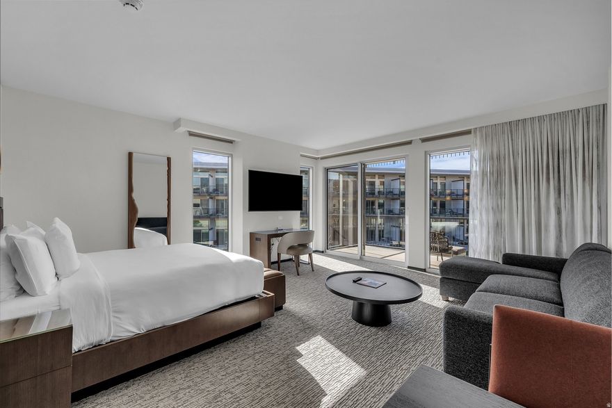 Enjoy the view of the Red Rocks in this end unit, paired with a refined living space of our Resort Center Studios, featuring Wolf and Sub-Zero appliances. A spacious balcony extends your living area outdoors. The resort offers world-class amenities - PGA golf, exceptional dining, a full spa, fitness center, convention space, and more on the way. This residence comes fully furnished, turn-key, and is currently enrolled in the rental program.