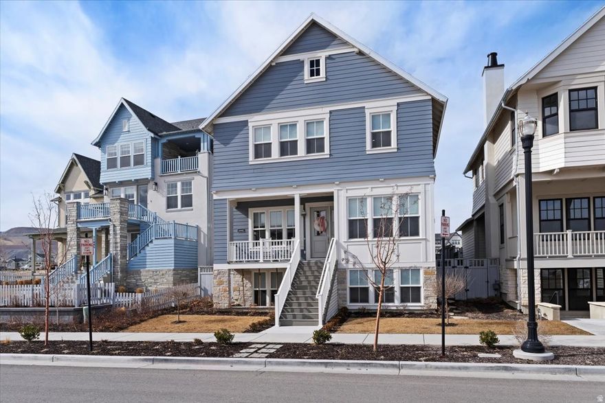 Come see this stunning home right next to the Daybreak Watercourse!  This remarkable home is loaded with updgrades, with fenced in yard, open layout, beautiful kitchen, finished basement, balcony views, and much more!  This is a MUST SEE!!