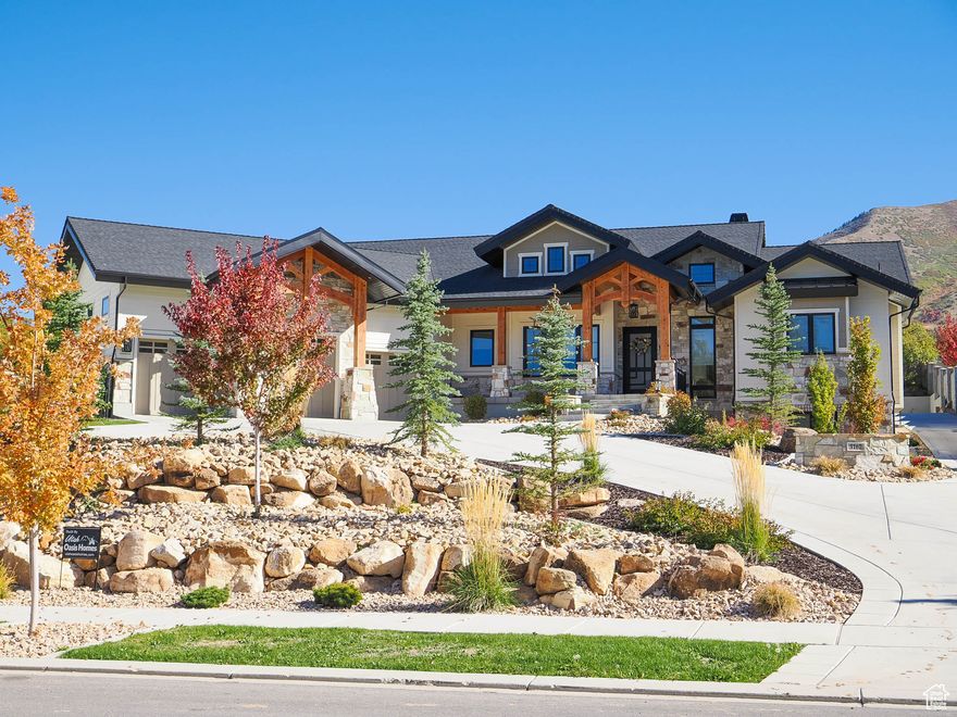 Stunning mountain modern rambler on .78 acre. Incredible neighborhood with amazing mountain views. Loaded with many upgrades-Open Theatre room, 10' basement ceilings, exposed exterior timbers, Sonos throughout, Andersen windows, heated garages, exercise room with dry sauna, 4 acres of open space directly across the street. Detached garage with mother-in law apartment. Just under 900 sq. ft of living area and 1166 sq. ft. of garage. 7 car garage total with house and detached garage.  Landscaping includes in- ground trampoline,  2 fire pits, Olympus concrete fencing, Trim lighting, professionally landscaped with mature trees. Buyer to verify all info.