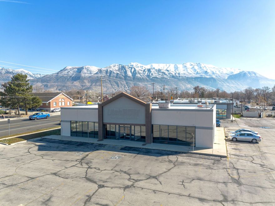 Position your business for success in one of Utah County's fastest-growing communities. This highly visible retail building sits directly on Main Street, an established commercial corridor with constant local traffic and strong consumer draw. Surrounded by thriving businesses, restaurants, and daytime activity drivers, the location benefits from excellent accessibility and walkability.  The property offers a functional interior layout with open retail floor space, private back area for storage or operations, and convenient customer parking. Large storefront windows deliver natural light and impactful signage opportunities for brand exposure.